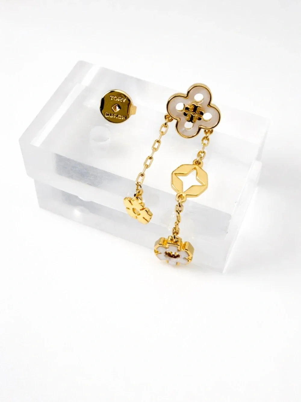 Tory Burch forget me not drop earrings.